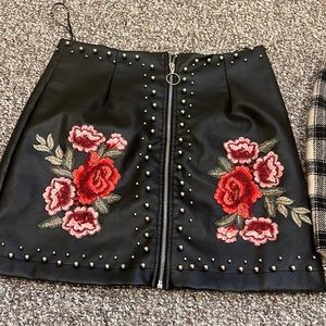 A cute trendy faux leather skirt! Worn twice. Comfy and flattering!